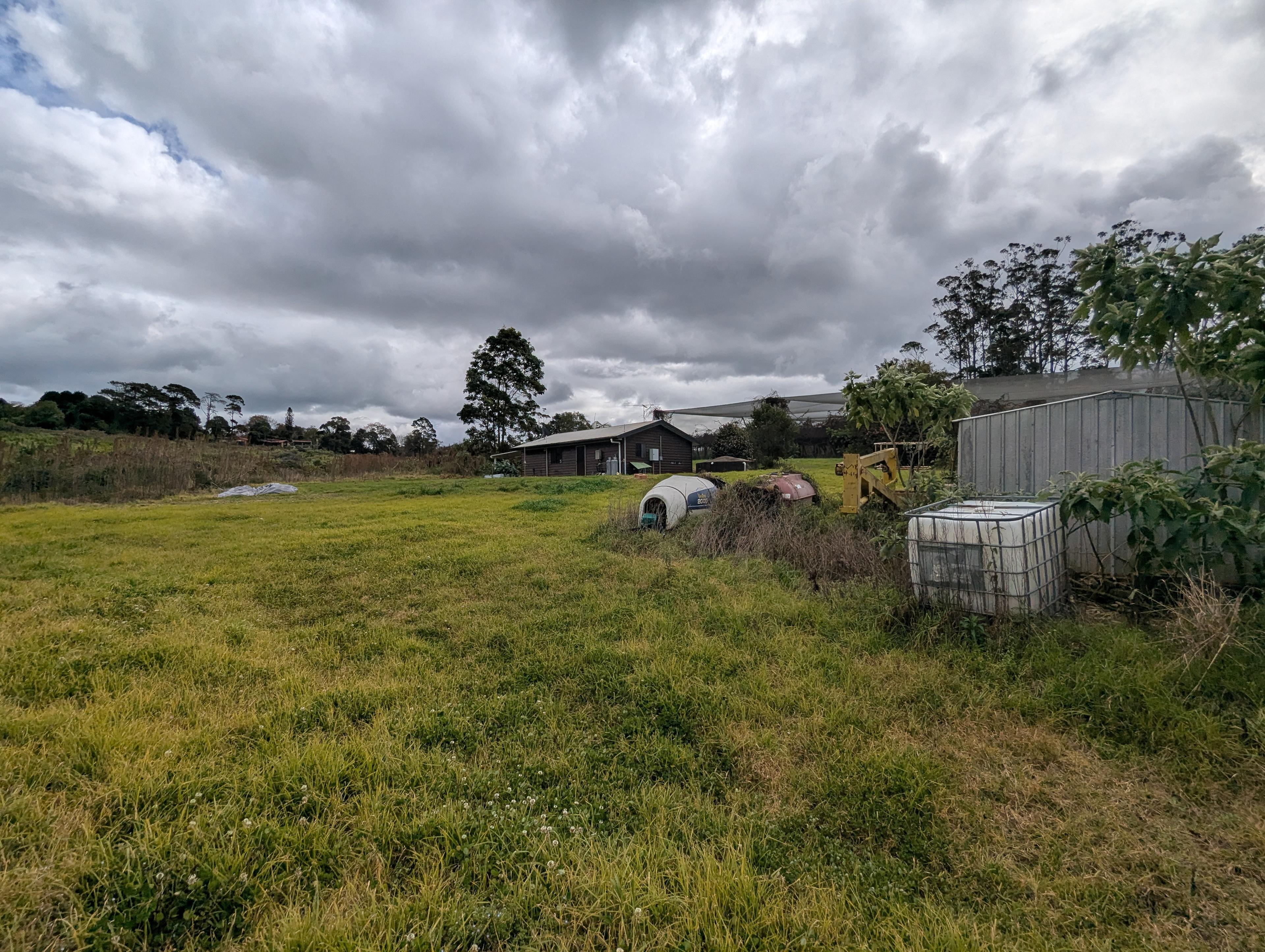 The open block, with the water tank, IBC, and shed the design works around