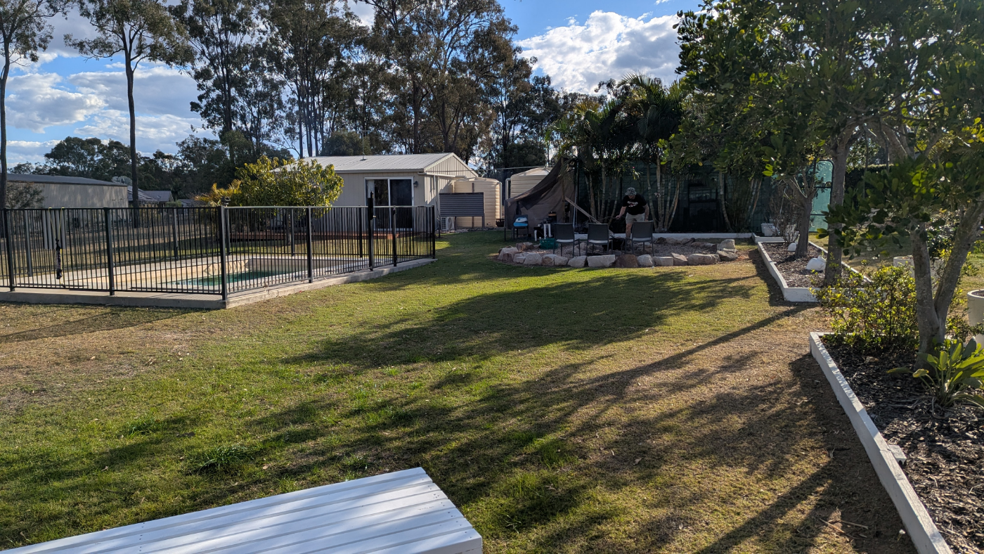 An existing fire pit and gathering area on the property, kept in the design rather than replaced